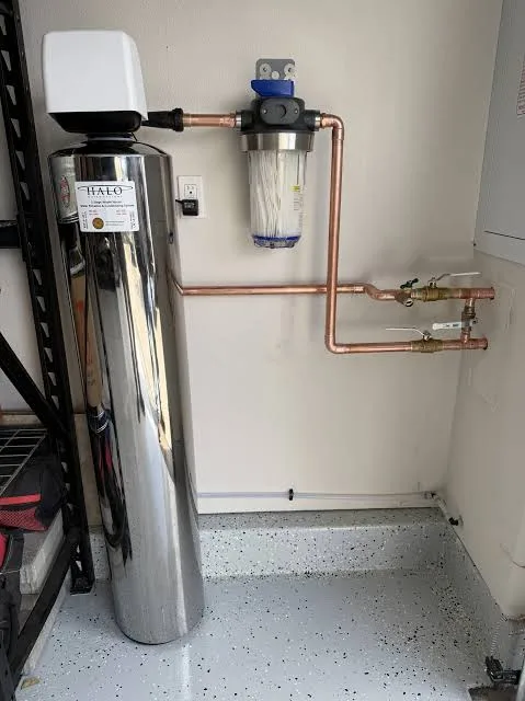 Whole-home system and prefilter installed in a garage